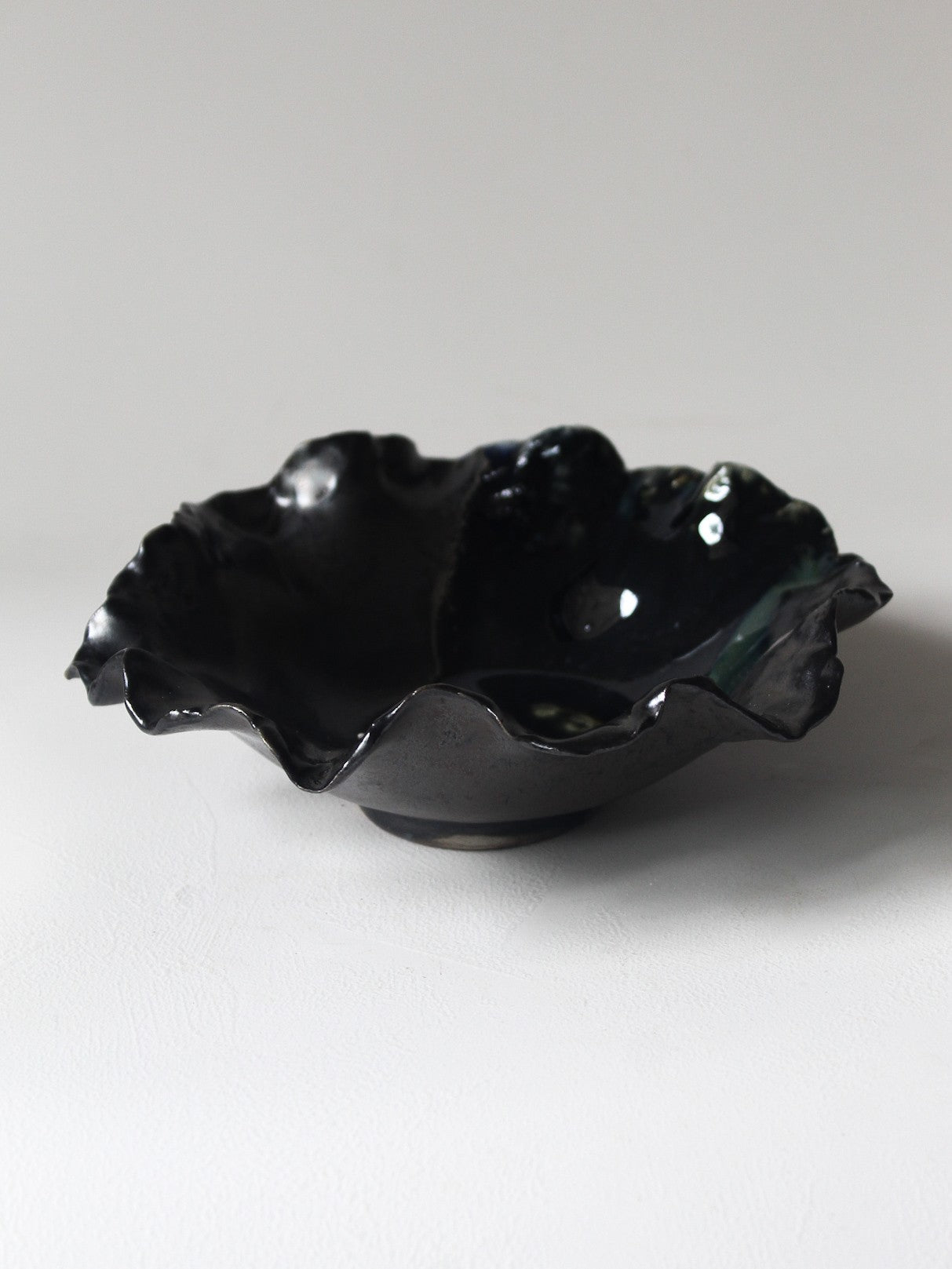 FOOTED CORAL BOWL IN DARK OCEAN