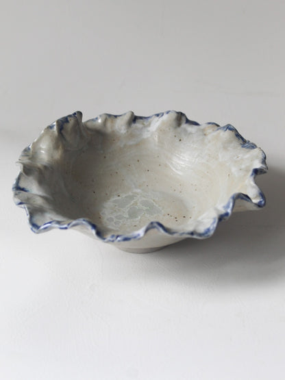 FOOTED CORAL BOWL WITH BLUE LINING